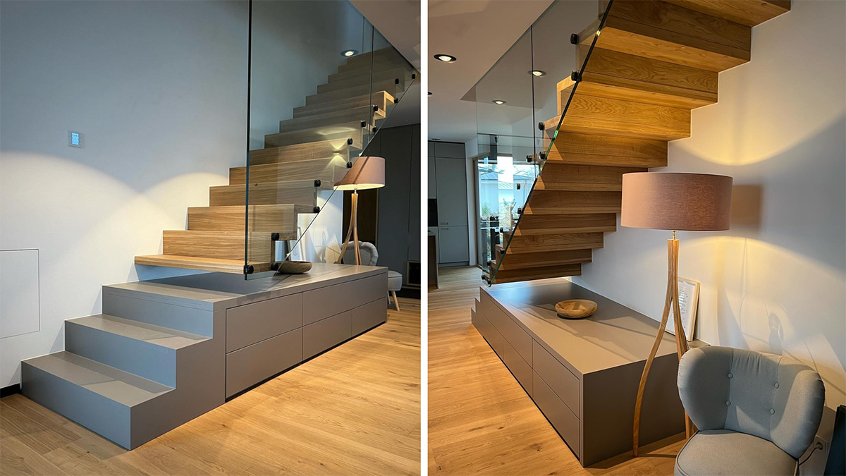 Design-Faltwerktreppe mit Unterschrank und Glasgeländer von Treppenbau Heinlein